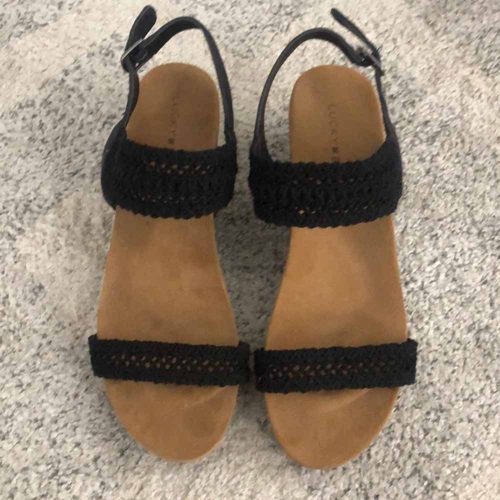 Lucky Brand Black Wedge Sandals Size 9.5 but fit like a 9. Never worn.